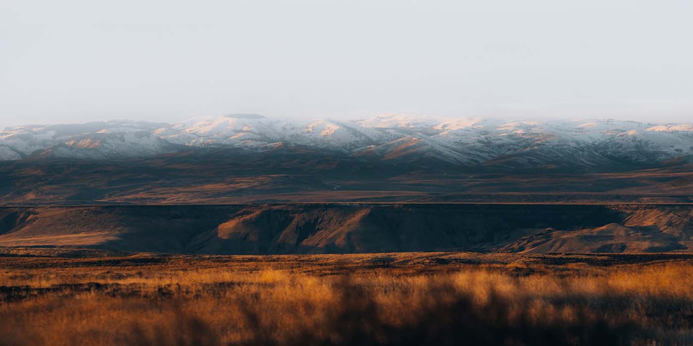 picture of sky, snowy mountain, and valley